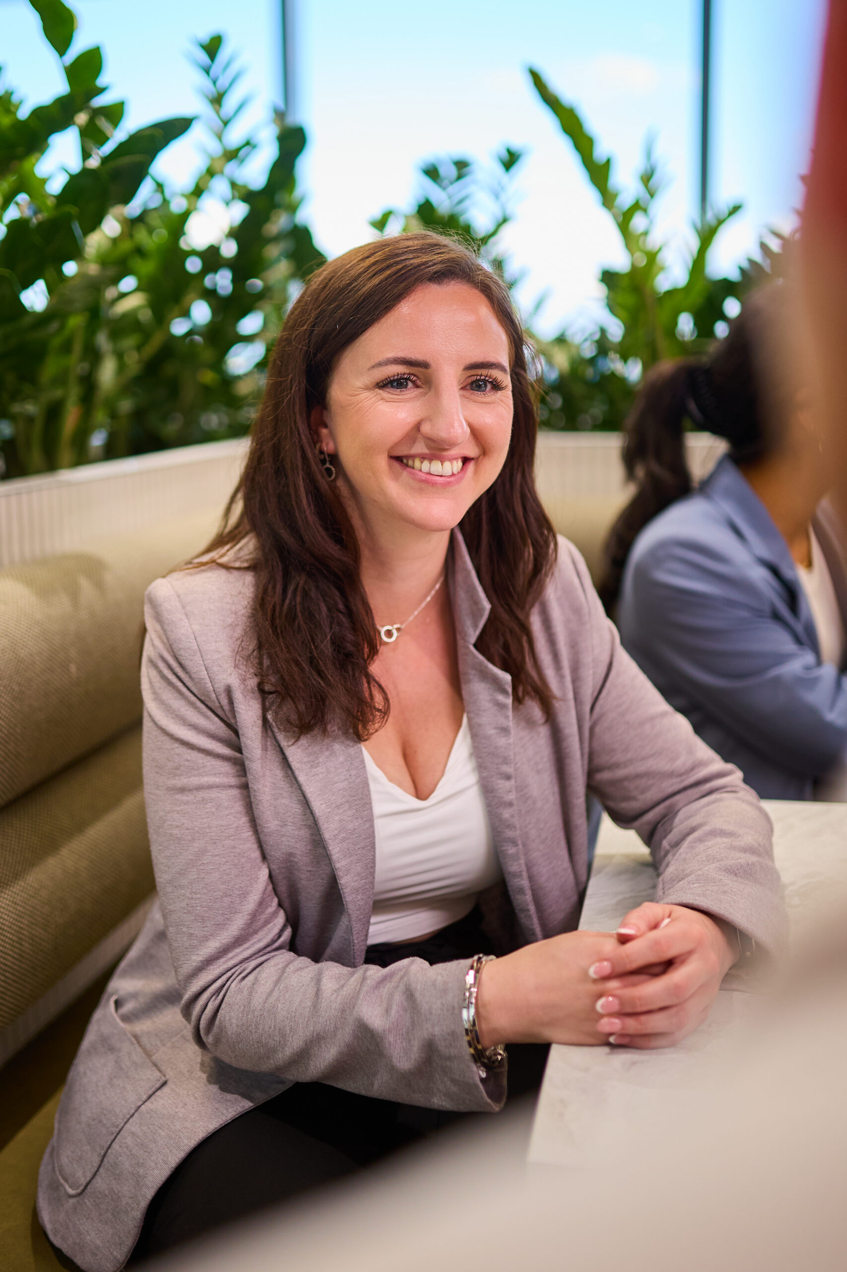 Client consulting with a WorkCover solicitor in a professional, welcoming Brisbane office at Richardson & Lyons.